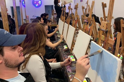 Students enjoy glow painting in Spain